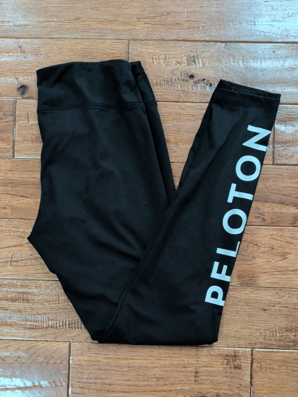 Peloton Woman's Black Leggings with White Logo Down Leg